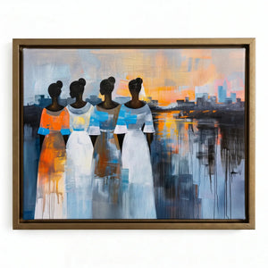 African wall decor in a gold floating frame, four Black women in flowing dresses, city skyline mirrored in the water