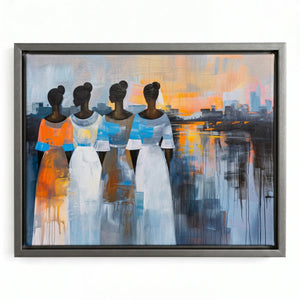 Four Black women in orange, white and blue dresses, silver floating frame, sunset reflections, African canvas wall art