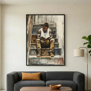 Black art for living room above a charcoal sofa with mustard pillow and fiddle leaf fig, man reading on stairs watercolor