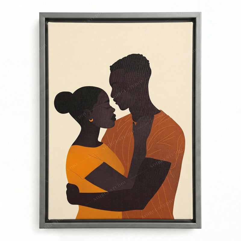 Black love painting in a silver floating frame, minimalist embrace in warm mustard and terracotta tones