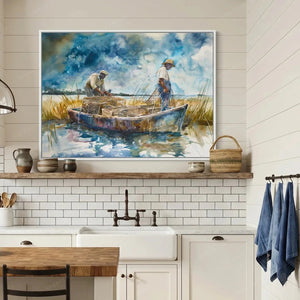 Black kitchen wall art, Gullah crabbing scene in a white frame above subway tile and a farmhouse sink