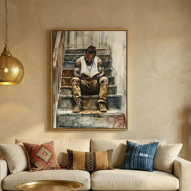Afrohemian decor above a cream sofa with kilim and indigo pillows, brass Moroccan pendant, man reading watercolor