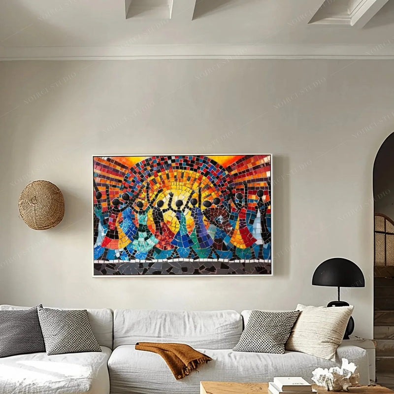 Black art for living room, mosaic sun dancers canvas above a white sofa with a woven basket on the wall