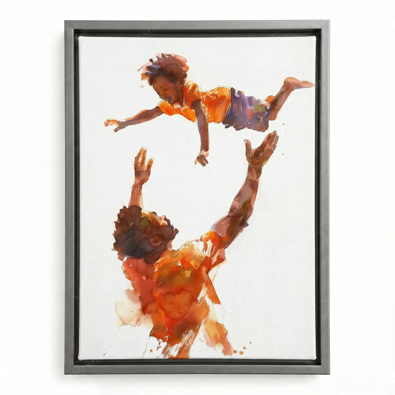 Black family portrait in a silver floating frame, father and son playing in warm watercolor washes