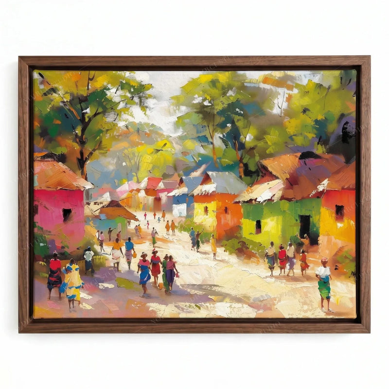 African canvas wall art in a walnut floating frame, villagers walking past colorful cottages under leafy green trees