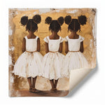 Rolled canvas print of three Black sisters, ready for custom framing, curled corner showing canvas texture