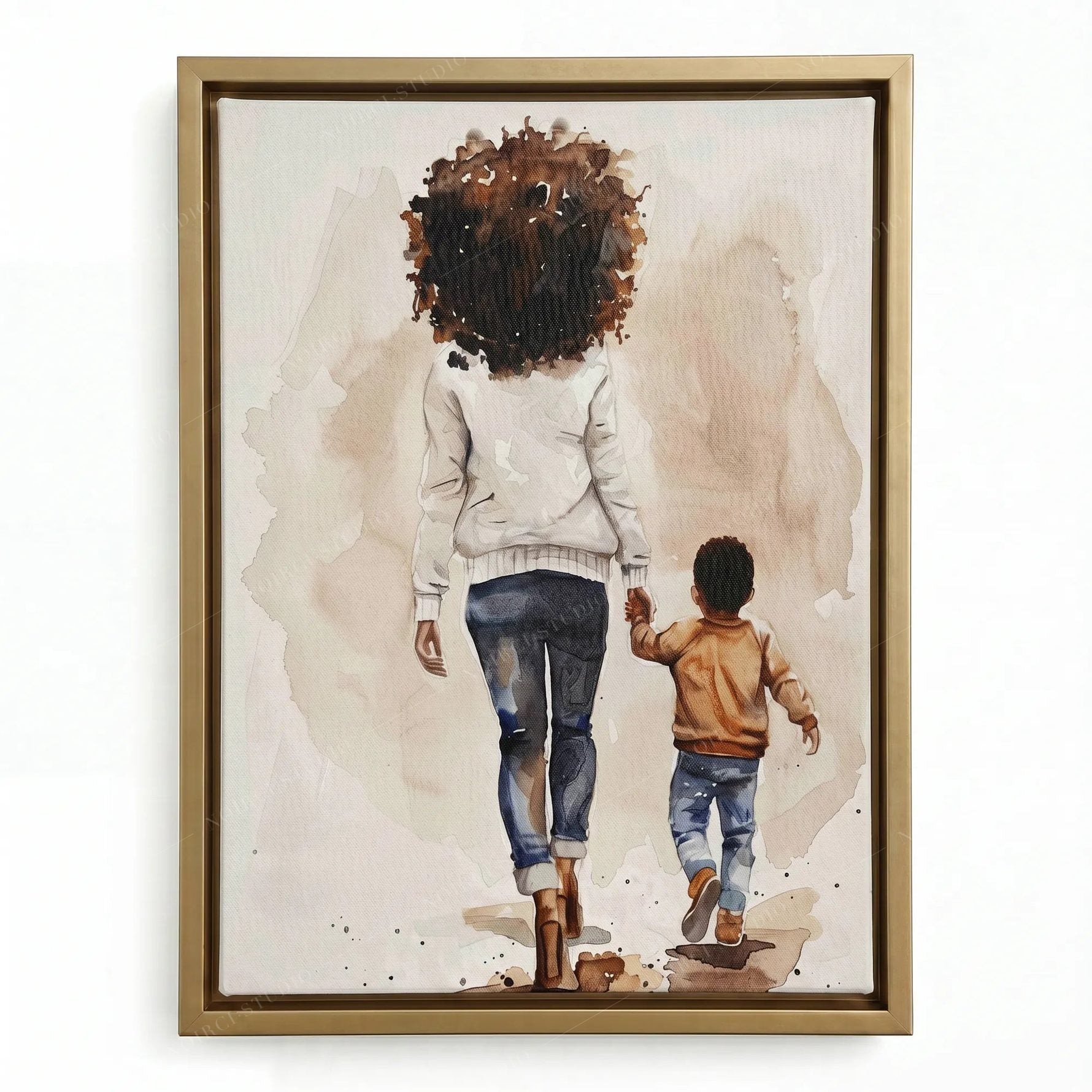 Black family artwork in a gold floating frame, watercolor of a mother and small son in a caramel jacket walking together