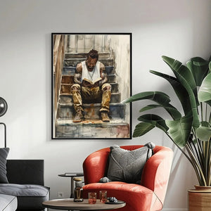 African American art above a coral armchair and bird of paradise plant, black-framed watercolor of a man reading