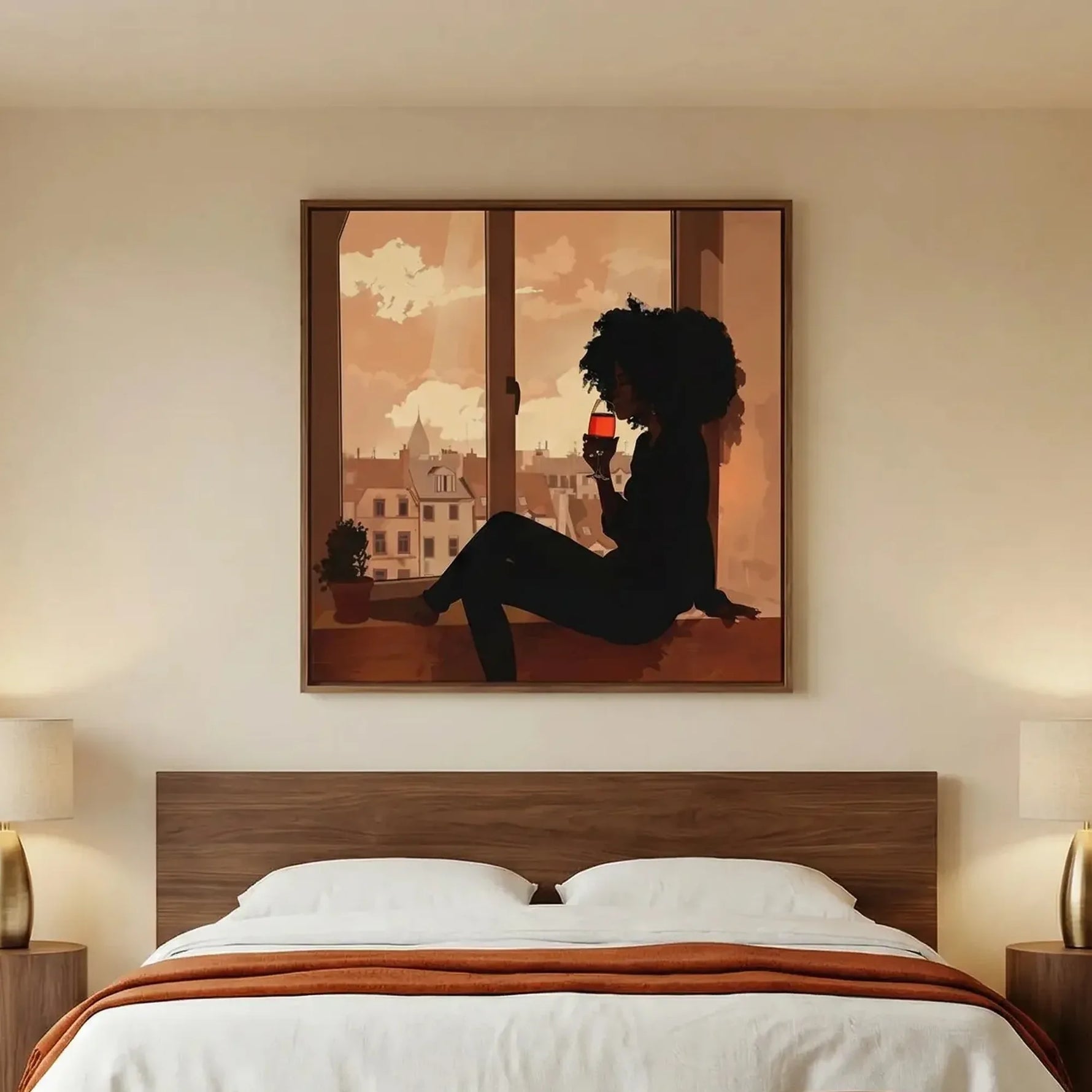 Black woman sipping wine silhouette in a bedroom with walnut headboard, white linens and a burnt orange throw
