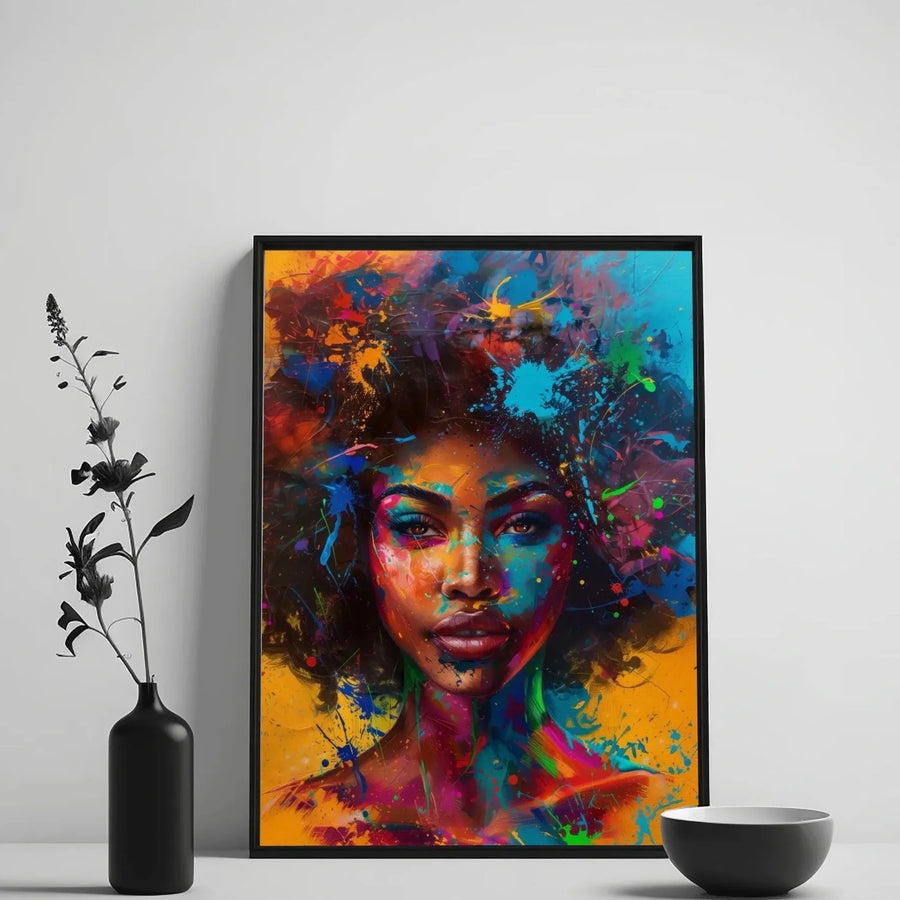 Afrofuturism wall art in a black frame on a white wall, styled with a black vase of dried stems and a ceramic bowl