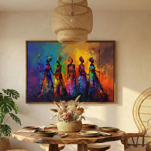Colorful African women canvas above a round wood dining table with dried grasses, rattan pendant and monstera