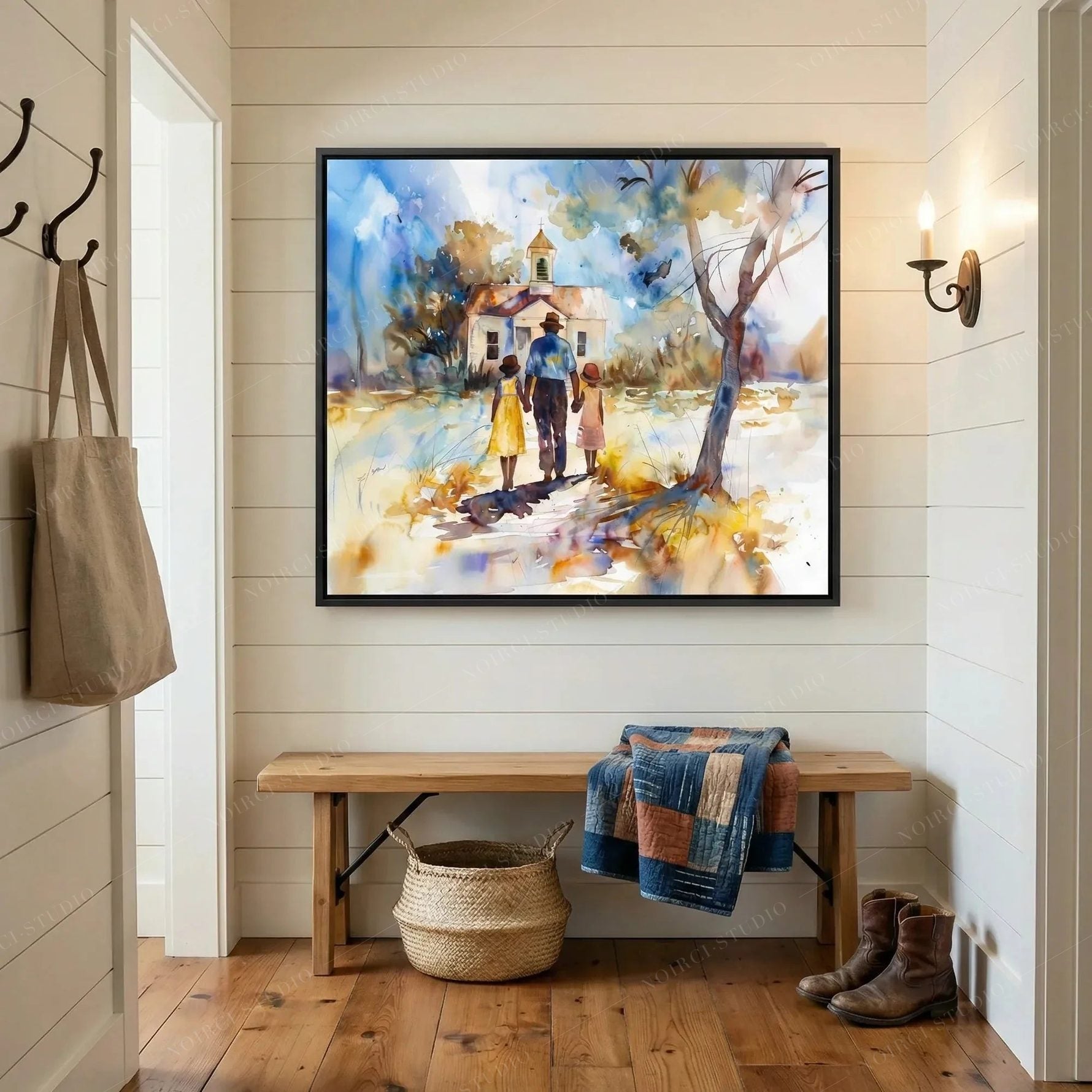 Gullah Geechee art for the entryway, watercolor above a wood bench with a folded quilt and woven basket