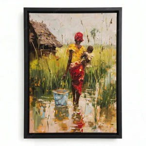 African canvas art in a black floating frame, mother in yellow and red carrying her baby past a thatched hut