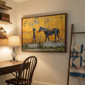 African American art for a home office, girl and horse art above a wood desk with a spindle chair and quilt ladder