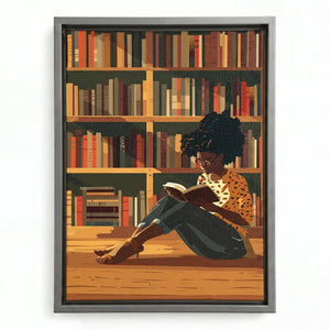 Black family wall art in a silver floating frame, girl in a leopard print top reading in a sunlit library