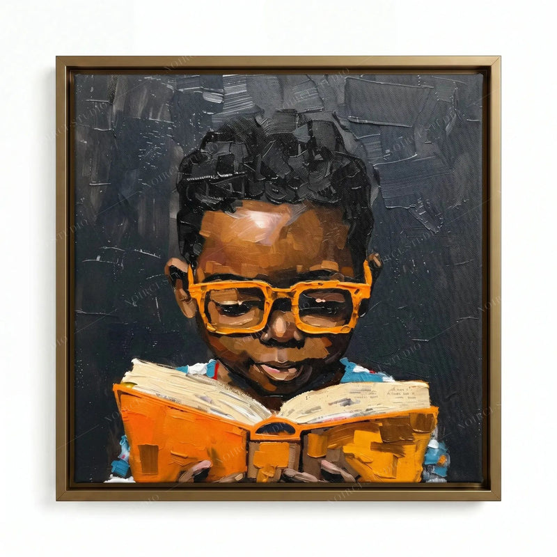 Black Boy Joy Reading wall art in a gold floating frame, showing a young reader holding an orange book